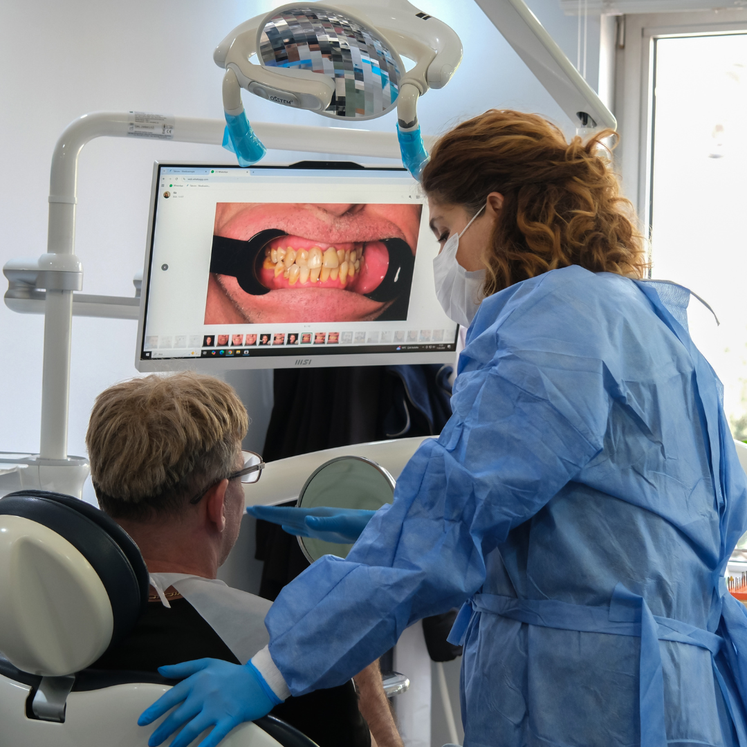 Full mouth dental treatment consultation in Turkey with UK patient discussing implant planning